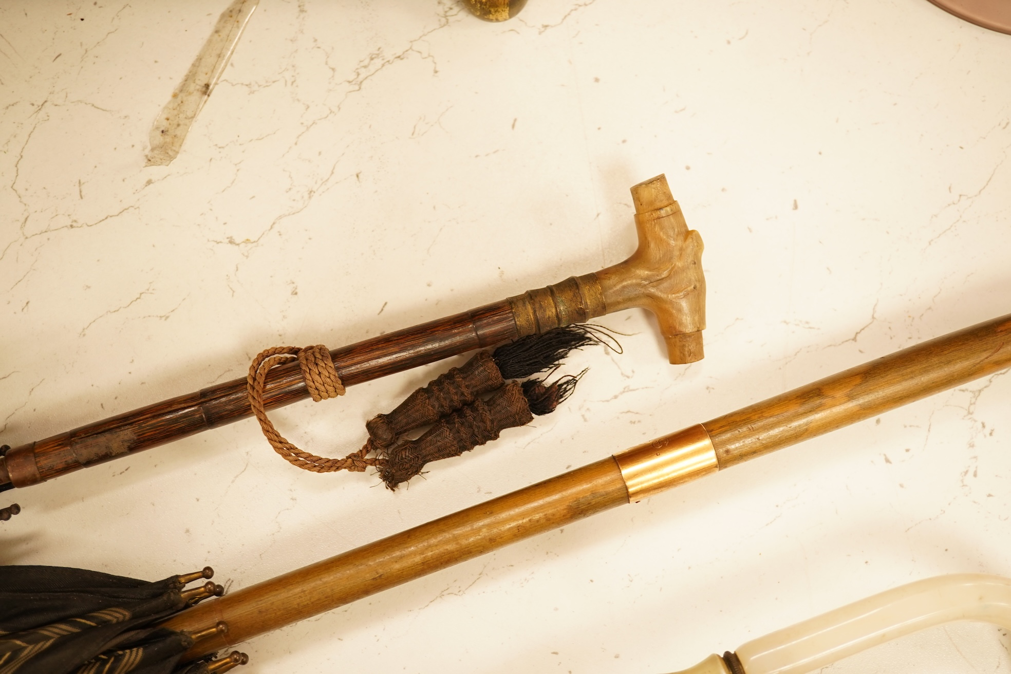An early 20th century gold mounted Brigg of London silk parasol and two others
